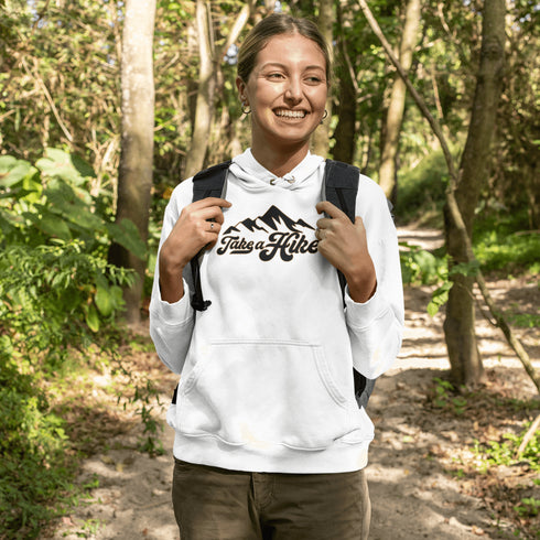 Introducing our rugged and stylish hiking hoodie, perfect for outdoor enthusiasts and nature lovers alike. Featuring a striking mountain graphic and the motivational slogan "Take A Hike", this sweater is designed to inspire your next camping adventure.